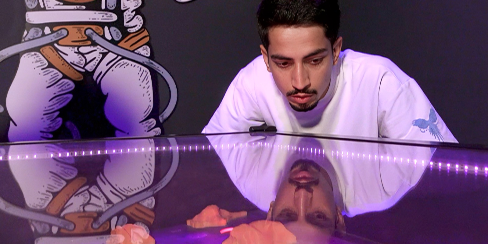 A player steering the ball through the tilting Crystal Maze