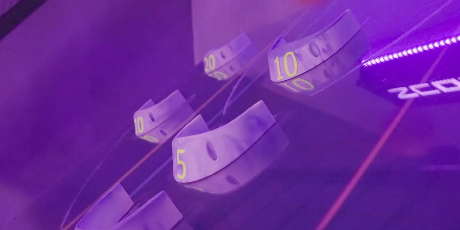 The numbered scoring cups in the Hitball room