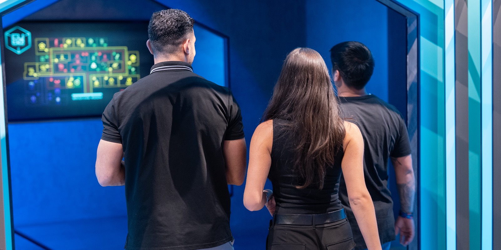 Two players walking the corridor between the challenge rooms